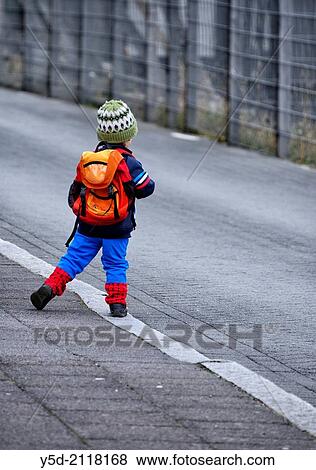 Children are extremally independent and responsible in Iceland, here a little boy waiting for a bus, Reykjavik, Iceland. View Large Photo Image Stock Photo - Children are extremally independent and responsible in Iceland, here a little boy waiting for a bus, Reykjavik, Iceland.. Fotosearch
