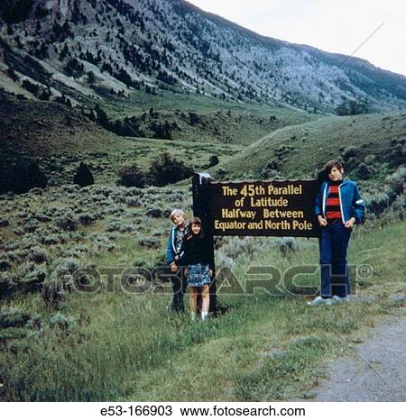 Children at 45th Parallel. Yellowstone National Park. Wyoming. USA View Large Photo Image Stock Image - Children at 45th Parallel. Yellowstone National Park. Wyoming. USA. Fotosearch