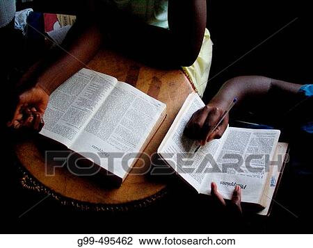 Children at the Kampala School for the Physically Handicapped, Uganda read bibles during Sunday school. View Large Photo Image Stock Image - Children at the Kampala School for the Physically Handicapped, Uganda read bibles during Sunday school.. Fotosearch