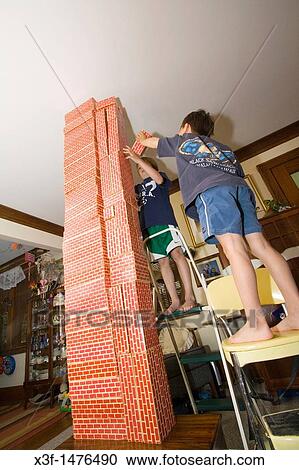 Children building a tower with blocks St Paul Minnesota MN USA View Large Photo Image Stock Image - Children building a tower with blocks St Paul Minnesota MN USA. Fotosearch