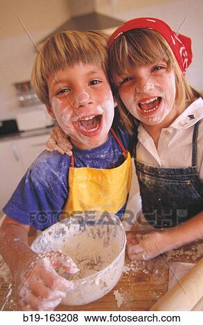 Children cooking View Large Photo Image Stock Photo - Children cooking. Fotosearch