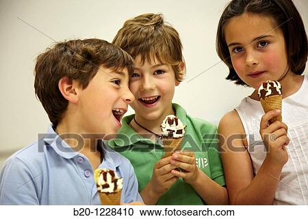 Children eating ice-cream cones, tasting session in sensory lab, AZTI-Tecnalia Marine and Food Research Center, Derio, Bizkaia, Euskadi, Spain View Large Photo Image Stock Image - Children eating ice-cream cones, tasting session in sensory lab, AZTI-Tecnalia Marine and Food Research Center, Derio, Bizkaia, Euskadi, Spain. Fotosearch