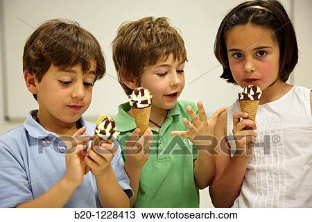 Children eating ice-cream cones, tasting session in sensory lab, AZTI-Tecnalia Marine and Food Research Center, Derio, Bizkaia, Euskadi, Spain View Large Photo Image Stock Image - Children eating ice-cream cones, tasting session in sensory lab, AZTI-Tecnalia Marine and Food Research Center, Derio, Bizkaia, Euskadi, Spain. Fotosearch