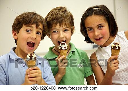 Children eating ice-cream cones, tasting session in sensory lab, AZTI-Tecnalia Marine and Food Research Center, Derio, Bizkaia, Euskadi, Spain View Large Photo Image Stock Photo - Children eating ice-cream cones, tasting session in sensory lab, AZTI-Tecnalia Marine and Food Research Center, Derio, Bizkaia, Euskadi, Spain. Fotosearch