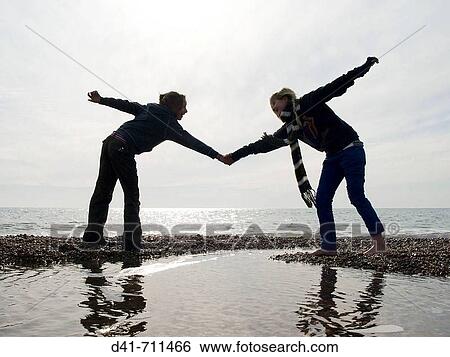 Children girls holding hands View Large Photo Image Stock Photograph - Children girls holding hands. Fotosearch