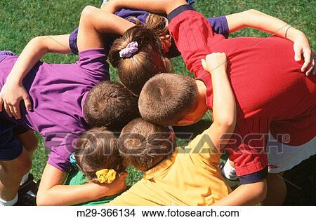 Picture - Children huddle.. Fotosearch