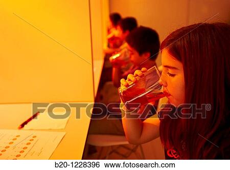 Children in a soft drink tasting session with red lights to disguise the drink colour, AZTI-Tecnalia Marine and Food Research Center, Derio, Bizkaia, Euskadi, Spain View Large Photo Image Stock Photograph - Children in a soft drink tasting session with red lights to disguise the drink colour, AZTI-Tecnalia Marine and Food Research Center, Derio, Bizkaia, Euskadi, Spain. Fotosearch