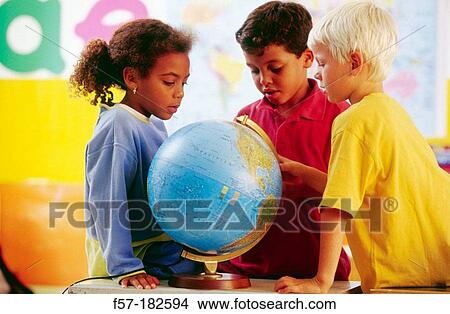 Picture - Children in classroom. Fotosearch
