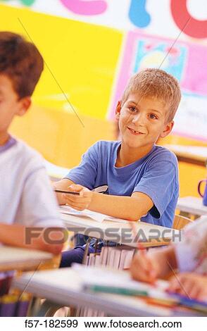 Children in classroom View Large Photo Image Stock Photo - Children in classroom. Fotosearch