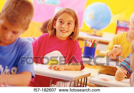 Children in classroom View Large Photo Image Stock Photo - Children in classroom. Fotosearch