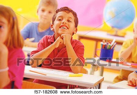Children in classroom View Large Photo Image Stock Photo - Children in classroom. Fotosearch