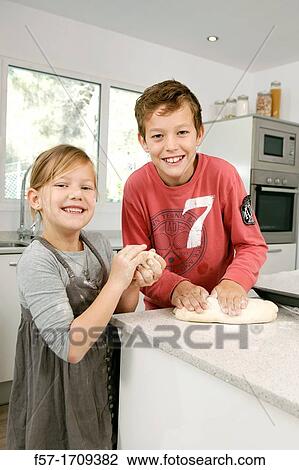 Children in the kitchen View Large Photo Image Stock Image - Children in the kitchen. Fotosearch