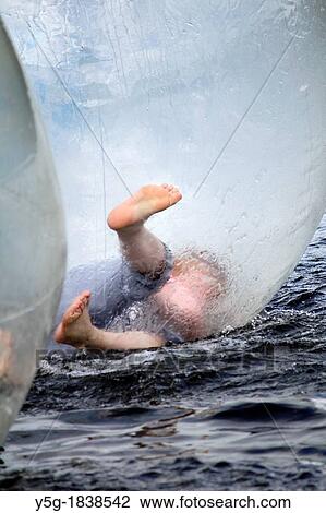 children in zorb ball on lake padarn in llanberis, wales, great britain, uk View Large Photo Image Stock Image - children in zorb ball on lake padarn in llanberis, wales, great britain, uk. Fotosearch