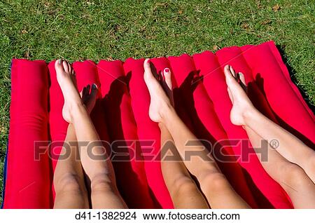 children legs on lilo wales View Large Photo Image Picture - children legs on lilo wales. Fotosearch