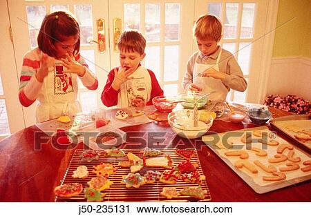 Children making christmas cookies View Large Photo Image Stock Image - Children making christmas cookies. Fotosearch