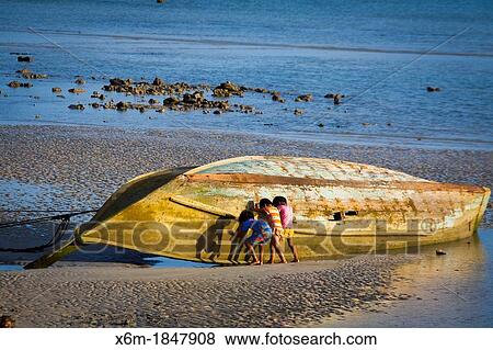 Children near a boat Ton Sai village Phi Phi Don island Krabi province, Andaman Sea, Thailand View Large Photo Image Stock Photo - Children near a boat Ton Sai village Phi Phi Don island Krabi province, Andaman Sea, Thailand. Fotosearch