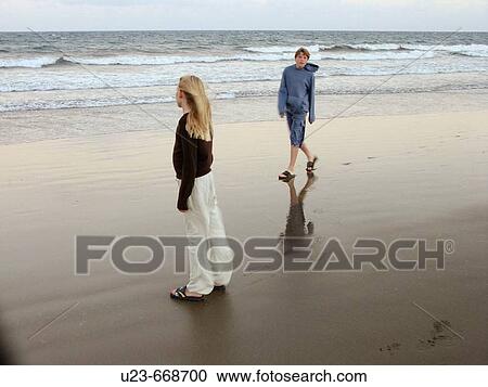 Children on a stormy beach View Large Photo Image Stock Image - Children on a stormy beach. Fotosearch