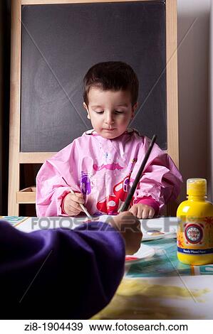 Children paint together View Large Photo Image Stock Photo - Children paint together. Fotosearch