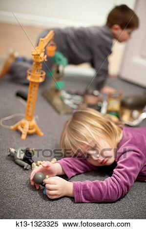 children playing at home View Large Photo Image Stock Photography - children playing at home. Fotosearch