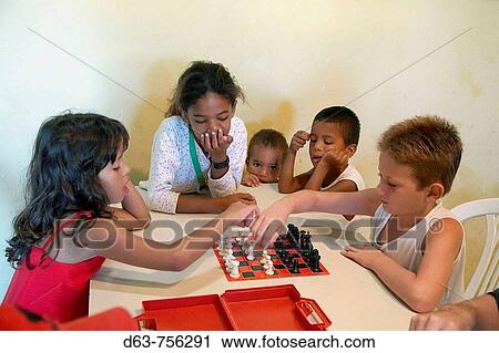 Children playing chess, Hope House, children's day care center at the favela of Balcau in Joao Pessoa, Paraiba State, Brazil View Large Photo Image Stock Image - Children playing chess, Hope House, children's day care center at the favela of Balcau in Joao Pessoa, Paraiba State, Brazil. Fotosearch