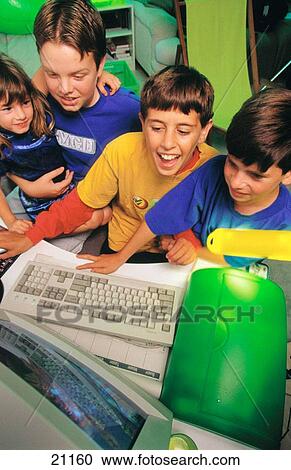Children playing computer games on the internet View Large Photo Image Stock Image - Children playing computer games on the internet. Fotosearch