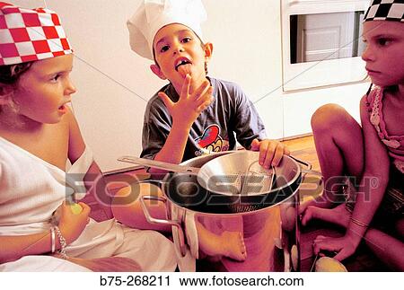 Children playing in the kitchen View Large Photo Image Stock Image - Children playing in the kitchen. Fotosearch