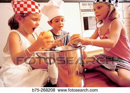 Children playing in the kitchen View Large Photo Image Stock Photo - Children playing in the kitchen. Fotosearch