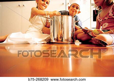 Children playing in the kitchen View Large Photo Image Stock Photo - Children playing in the kitchen. Fotosearch