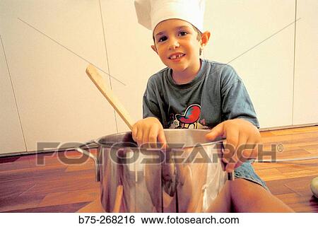 Children playing in the kitchen View Large Photo Image Stock Photograph - Children playing in the kitchen. Fotosearch