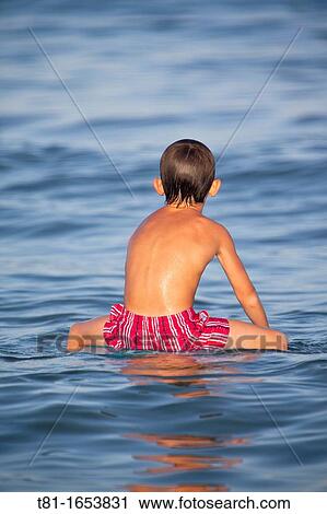 Children playing in the sand View Large Photo Image Stock Image - Children playing in the sand. Fotosearch