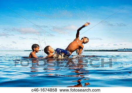 Children playing, Novo Ariau area Rio Black River, Amazonas state, the Amazon, Brazil. View Large Photo Image Stock Photo - Children playing, Novo Ariau area Rio Black River, Amazonas state, the Amazon, Brazil.. Fotosearch
