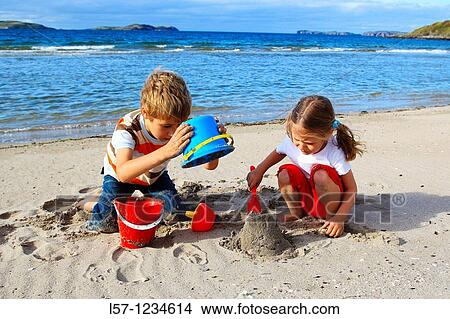 children playing on sandy beach, Sutherland, Scotland View Large Photo Image Picture - children playing on sandy beach, Sutherland, Scotland. Fotosearch