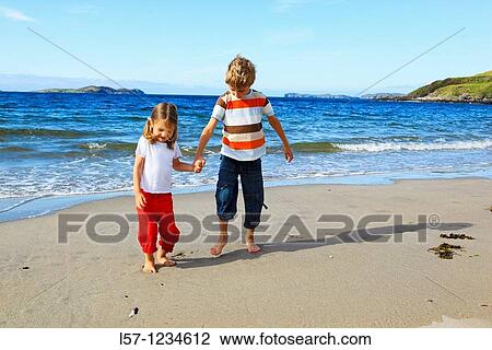 children playing on sandy beach, Sutherland, Scotland View Large Photo Image Stock Image - children playing on sandy beach, Sutherland, Scotland. Fotosearch