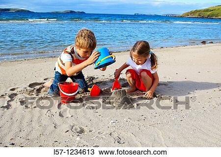 children playing on sandy beach, Sutherland, Scotland View Large Photo Image Stock Image - children playing on sandy beach, Sutherland, Scotland. Fotosearch