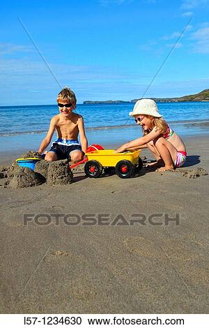 children playing on sandy beach, Sutherland, Scotland View Large Photo Image Stock Image - children playing on sandy beach, Sutherland, Scotland. Fotosearch