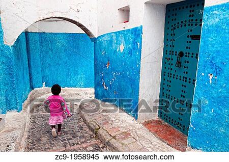 Children playing on the beautiful streets of Kasbah of Oudayas, Rabat, Morocco. View Large Photo Image Stock Photography - Children playing on the beautiful streets of Kasbah of Oudayas, Rabat, Morocco.. Fotosearch
