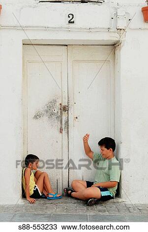 Children playing on the street, Tarifa. CBdiz province, Andalusia, Spain View Large Photo Image Stock Image - Children playing on the street, Tarifa. CBdiz province, Andalusia, Spain. Fotosearch