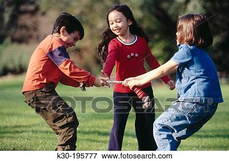 Children playing outdoors View Large Photo Image Stock Photo - Children playing outdoors. Fotosearch