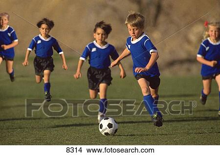 Children playing soccer View Large Photo Image Picture - Children playing soccer. Fotosearch