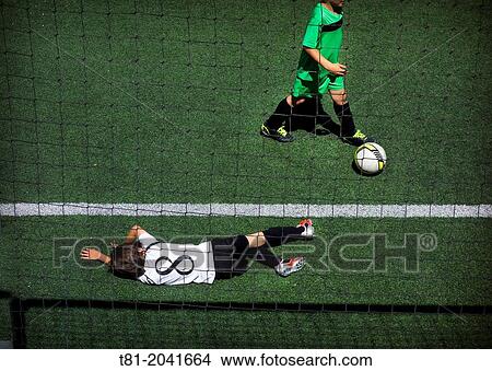 Children playing soccer View Large Photo Image Picture - Children playing soccer. Fotosearch