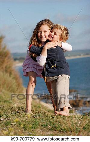 Stock Photo - Children playing. Tarifa, Cadiz province, Andalusia, Spain. Fotosearch