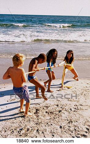Children pulling in tug-of-war View Large Photo Image Stock Image - Children pulling in tug-of-war. Fotosearch