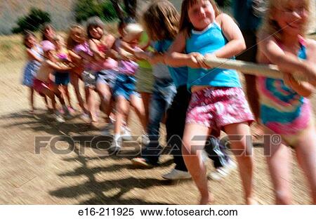 Children pulling in tug-of-war View Large Photo Image Stock Photography - Children pulling in tug-of-war. Fotosearch