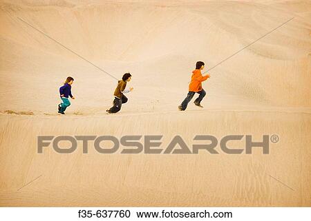Children run on Sand Dunes, Baja California, Mexico View Large Photo Image Stock Image - Children run on Sand Dunes, Baja California, Mexico. Fotosearch
