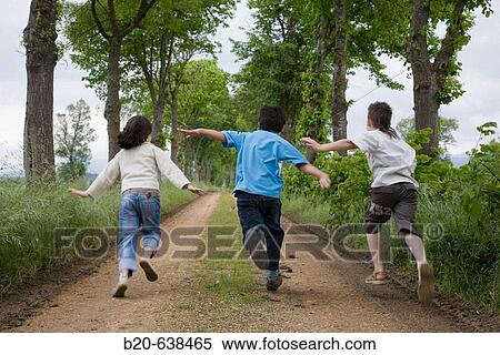 Children running by tree-lined path. Arkaute, Alava, Euskadi, Spain View Large Photo Image Stock Photography - Children running by tree-lined path. Arkaute, Alava, Euskadi, Spain. Fotosearch