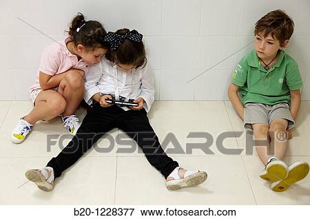 Children using a portable console, AZTI-Tecnalia Marine and Food Research Center, Derio, Bizkaia, Euskadi, Spain View Large Photo Image Stock Photo - Children using a portable console, AZTI-Tecnalia Marine and Food Research Center, Derio, Bizkaia, Euskadi, Spain. Fotosearch