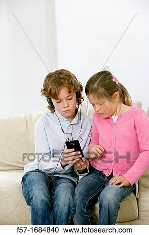 Children using smartphone View Large Photo Image Stock Image - Children using smartphone. Fotosearch