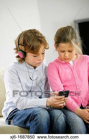Children using smartphone View Large Photo Image Stock Image - Children using smartphone. Fotosearch