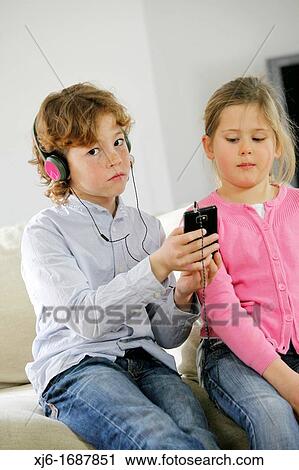 Children using smartphone View Large Photo Image Stock Image - Children using smartphone. Fotosearch