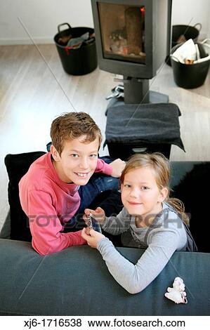 Stock Photo - Children using smartphone. Fotosearch
